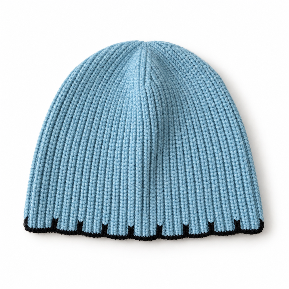 Dusty-blue rib-knit beanie with a rounded crown and black stitched lower edge